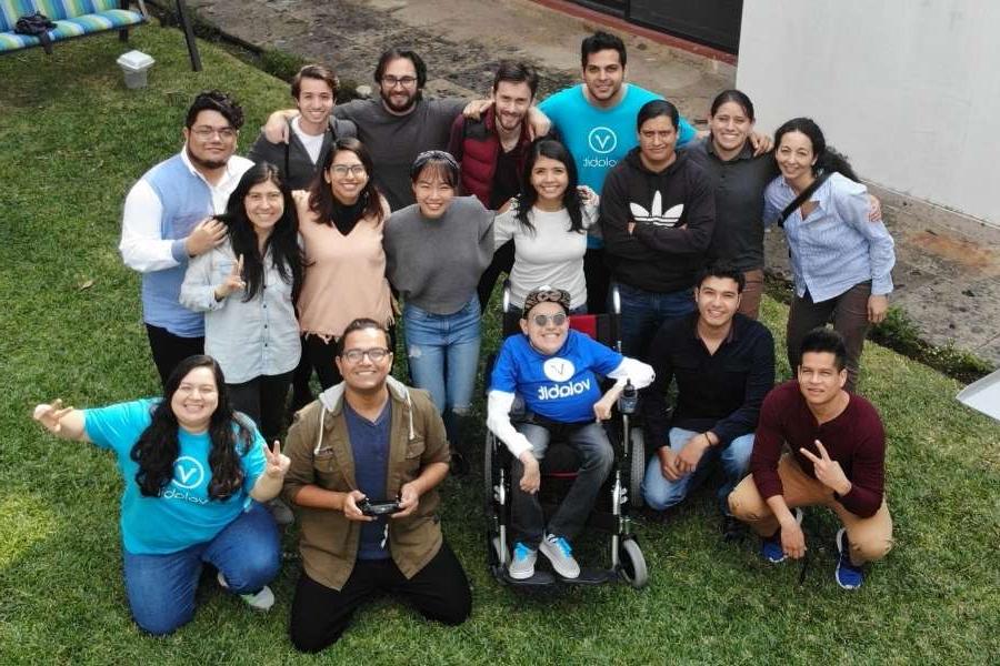 Hannah and Tomas pose outside with their team at Volabit and Mifiel